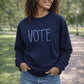 VOTE Embroidered Glitter Puff Fleece Crew Sweatshirt